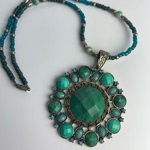 Hand beaded necklace with statement pendant